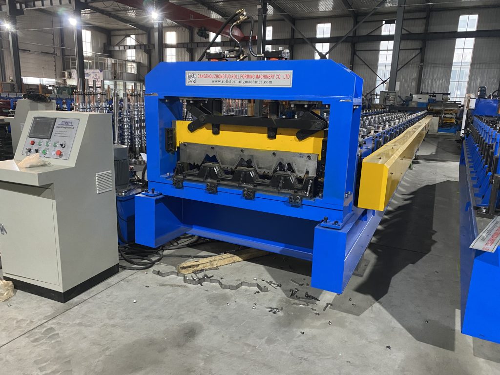 Composite deck roll forming machine